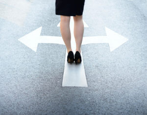 woman choosing between paths